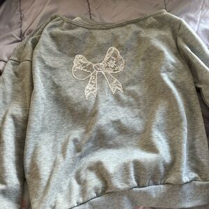 Gray Sweatshirt with Lace Bow Design